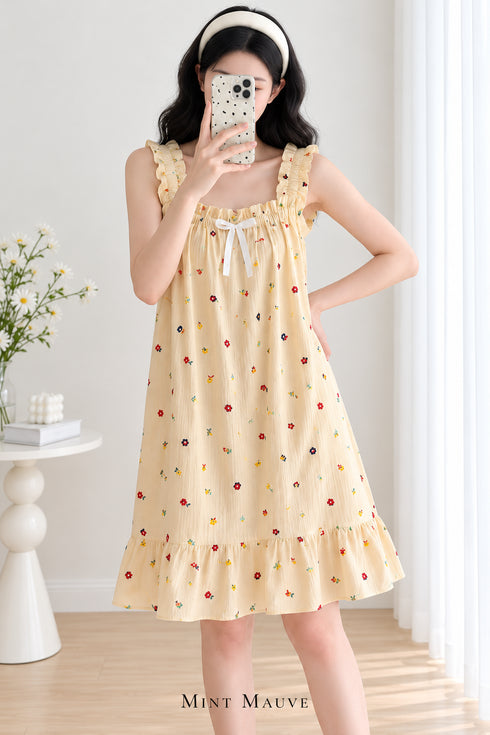 Sunday Reverie Padded Nightdress in Buttercream, with ruffled straps, white bow and knee-length flounce hem