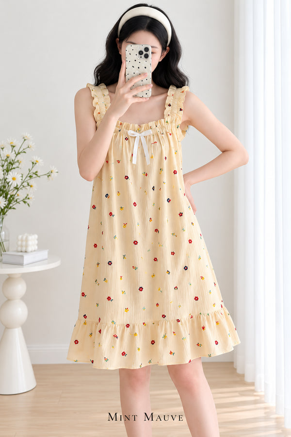 Sunday Reverie Padded Nightdress in Buttercream, with ruffled straps, white bow and knee-length flounce hem