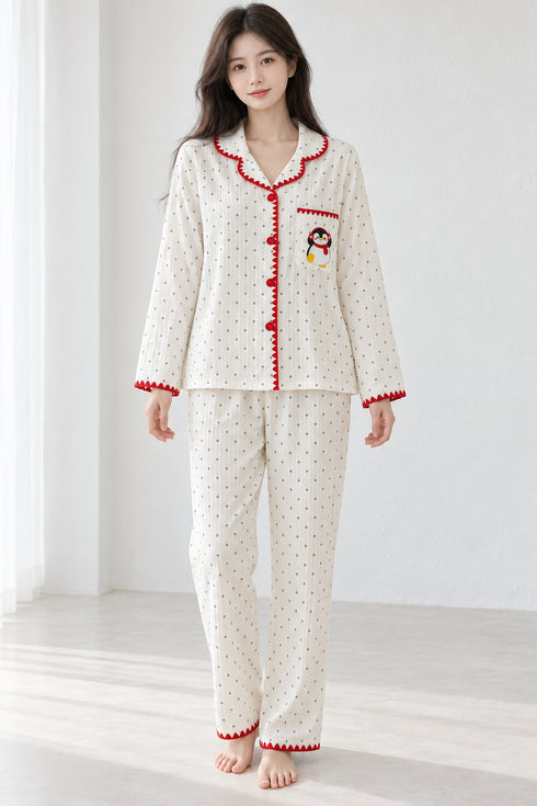 Moonlit Crochet-Trim Pyjama Set – Ivory Red Penguin; full-length portrait showing crochet-trim long-sleeve top and matching trousers