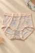 Soft Silhouette Hipster Briefs in Peach Cream — portrait flat lay with botanical fan