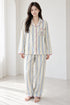Moonlit Crochet-Trim Pyjama Set – Powder Blue Stripe; full-length portrait showing crochet-trim long-sleeve top and matching trousers