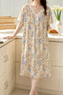 The Bow Edit Nightdress – Vanilla Blue Floral; lace V-neck, white bow, short sleeves, hem just above mid-calf