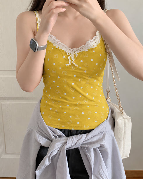 The Coquette Lace Camisole in Mustard Yellow worn by an adult model