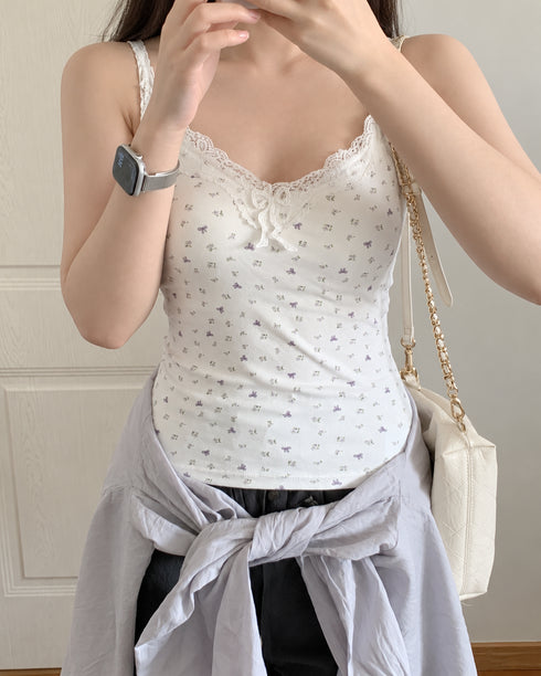 The Coquette Lace Camisole in White worn by an adult model